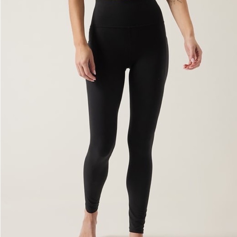 Athleta Salutation Stash Pocket Tight Legging Black XL. Worn a few times.